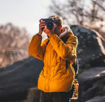 A photographer taking picture with camera